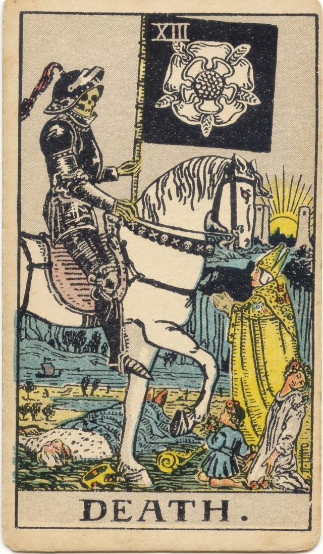 Death: The armoured skeleton, the white horse, the black banner with the white rose, the fallen king. Rider–Waite–Smith tarot, 1909.