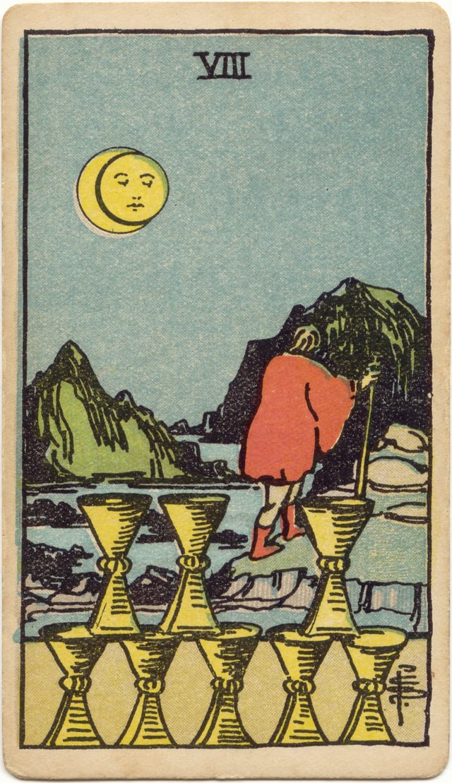 Eight of Cups: The stacked cups, the gap in the upper row, the red-cloaked traveller, the moon. Rider–Waite–Smith tarot, 1909.