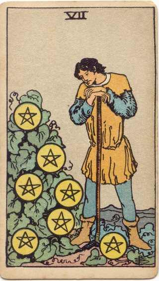 Seven of Pentacles, Rider–Waite–Smith tarot, 1909